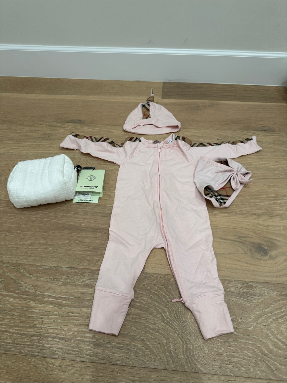 Authentic Baby One-Piece with Signature Check Trim + pouch + hat + bib